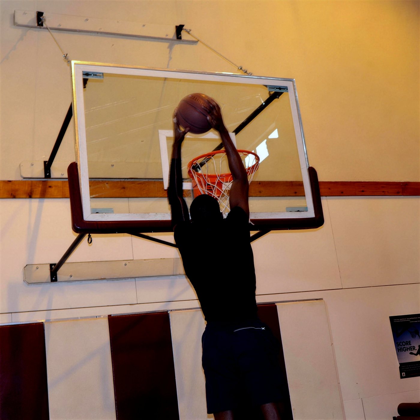 Two hand dunk finished through the rim at the base gym in Nevada